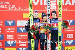 28.12.2022, Villach, Austria (AUT): Anna Odine Stroem (NOR), Eva Pinkelnig (AUT), Nika Kriznar (SLO), (l-r) - FIS world cup ski jumping women, individual HS98, Villach (AUT). www.nordicfocus.com. © Thibaut/NordicFocus. Every downloaded picture is fee-liable.