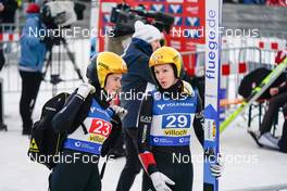 28.12.2022, Villach, Austria (AUT): Lara Malsiner (ITA), Jessica Malsiner (ITA), (l-r)  - FIS world cup ski jumping women, individual HS98, Villach (AUT). www.nordicfocus.com. © Thibaut/NordicFocus. Every downloaded picture is fee-liable.