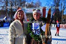 05.03.2022, Mora, Sweden (SWE): feature: youg boy at finish, old school - Visma Ski Classics Vasaloppet, Mora (SWE). www.nordicfocus.com. © Reichert/NordicFocus. Every downloaded picture is fee-liable.