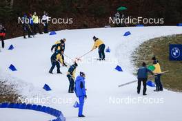 11.01.2023, Ruhpolding, Germany (GER): Event Feature: Volunteers prepare the track - IBU World Cup Biathlon, individual men, Ruhpolding (GER). www.nordicfocus.com. © Manzoni/NordicFocus. Every downloaded picture is fee-liable.