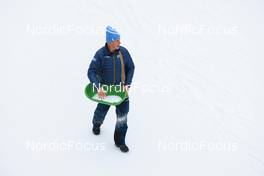 15.01.2023, Ruhpolding, Germany (GER): Event Feature: Volunteers put salt on the track - IBU World Cup Biathlon, mass men, Ruhpolding (GER). www.nordicfocus.com. © Manzoni/NordicFocus. Every downloaded picture is fee-liable.