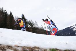 15.01.2023, Ruhpolding, Germany (GER): Johannes Thingnes Boe (NOR), Fabien Claude (FRA), (l-r) - IBU World Cup Biathlon, mass men, Ruhpolding (GER). www.nordicfocus.com. © Manzoni/NordicFocus. Every downloaded picture is fee-liable.