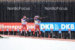 13.01.2023, Ruhpolding, Germany (GER): Adam Runnalls (CAN), Dajan Danuser (SUI), (l-r) - IBU World Cup Biathlon, relay men, Ruhpolding (GER). www.nordicfocus.com. © Manzoni/NordicFocus. Every downloaded picture is fee-liable.