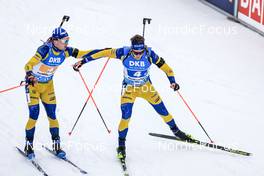 13.01.2023, Ruhpolding, Germany (GER): Jesper Nelin (SWE), Martin Ponsiluoma (SWE), (l-r) - IBU World Cup Biathlon, relay men, Ruhpolding (GER). www.nordicfocus.com. © Manzoni/NordicFocus. Every downloaded picture is fee-liable.