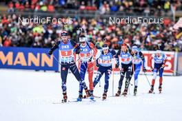 13.01.2023, Ruhpolding, Germany (GER): Sturla Holm Laegreid (NOR), Eric Perrot (FRA), Tuomas Harjula (FIN), David Zobel (GER), (l-r) - IBU World Cup Biathlon, relay men, Ruhpolding (GER). www.nordicfocus.com. © Manzoni/NordicFocus. Every downloaded picture is fee-liable.