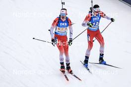 13.01.2023, Ruhpolding, Germany (GER): Adam Runnalls (CAN), Trevor Kiers (CAN), (l-r) - IBU World Cup Biathlon, relay men, Ruhpolding (GER). www.nordicfocus.com. © Manzoni/NordicFocus. Every downloaded picture is fee-liable.