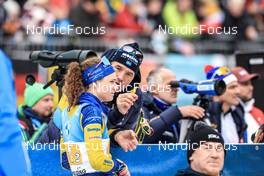 14.01.2023, Ruhpolding, Germany (GER): Hanna Oeberg (SWE), Jean-Marc Chabloz (SUI), coach Team Sweden, (l-r) - IBU World Cup Biathlon, relay women, Ruhpolding (GER). www.nordicfocus.com. © Manzoni/NordicFocus. Every downloaded picture is fee-liable.
