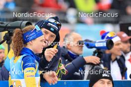 14.01.2023, Ruhpolding, Germany (GER): Hanna Oeberg (SWE), Jean-Marc Chabloz (SUI), coach Team Sweden, (l-r) - IBU World Cup Biathlon, relay women, Ruhpolding (GER). www.nordicfocus.com. © Manzoni/NordicFocus. Every downloaded picture is fee-liable.