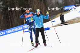 10.01.2023, Ruhpolding, Germany (GER): Cameron Morton (USA) with his daughter Darcie Morton (AUS), (l-r) - IBU World Cup Biathlon, training, Ruhpolding (GER). www.nordicfocus.com. © Manzoni/NordicFocus. Every downloaded picture is fee-liable.