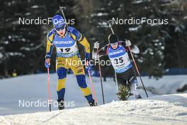 20.01.2023, Antholz, Italy (ITA): Martin Ponsiluoma (SWE), Pavel Magazeev (MDA), (l-r) - IBU World Cup Biathlon, sprint men, Antholz (ITA). www.nordicfocus.com. © Manzoni/NordicFocus. Every downloaded picture is fee-liable.