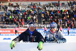 09.03.2023, Oestersund, Sweden, (SWE): Infront technician Paul and Gerald Sonnberger (AUT) take a rest - IBU World Cup Biathlon, individual men, Oestersund (SWE). www.nordicfocus.com. © Manzoni/NordicFocus. Every downloaded picture is fee-liable.
