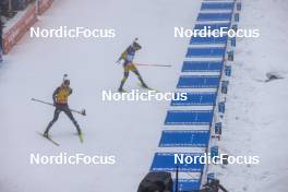 19.03.2023, Oslo, Norway (NOR): Johannes Thingnes Boe (NOR), Martin Ponsiluoma (SWE), (l-r) - IBU World Cup Biathlon, mass men, Oslo (NOR). www.nordicfocus.com. © Manzoni/NordicFocus. Every downloaded picture is fee-liable.
