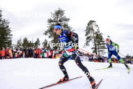 18.03.2023, Oslo, Norway (NOR): Tommaso Giacomel (ITA), Anton Vidmar (SLO), (l-r) - IBU World Cup Biathlon, pursuit men, Oslo (NOR). www.nordicfocus.com. © Manzoni/NordicFocus. Every downloaded picture is fee-liable.