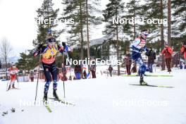 16.03.2023, Oslo, Norway (NOR): Johannes Thingnes Boe (NOR), Olli Hiidensalo (FIN), (l-r) - IBU World Cup Biathlon, sprint men, Oslo (NOR). www.nordicfocus.com. © Manzoni/NordicFocus. Every downloaded picture is fee-liable.