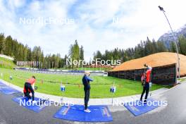 20.05.2023, Lenzerheide, Switzerland (SUI): Niklas Hartweg (SUI), Remo Krug (GER) coach Team Switzerland, Gion Stalder (SUI), Sebastian Stalder (SUI), (l-r) - Biathlon summer training, Lenzerheide (SUI). www.nordicfocus.com. © Manzoni/NordicFocus. Every downloaded picture is fee-liable.