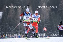 27.01.2023, Lenzerheide, Switzerland (SUI): Andrejs Rastorgujevs (LAT), Wojciech Skorusa (POL), (l-r) - IBU Open European Championships Biathlon, sprint men, Lenzerheide (SUI). www.nordicfocus.com. © Manzoni/NordicFocus. Every downloaded picture is fee-liable.
