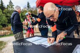 16.09.2023, La Feclaz, France (FRA): Event Feature: Race technician checking the start list - Biathlon Samse Summer Tour, sprint, La Feclaz (FRA). www.nordicfocus.com. © Manzoni/NordicFocus. Every downloaded picture is fee-liable.