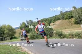 27.08.2023, Brezno-Osrblie, Slovakia (SVK): Konrad Badacz (POL), Jan Gunka (POL), (l-r) - IBU Summer Biathlon World Championships, pursuit junior men, Brezno-Osrblie (SVK). www.nordicfocus.com. © Manzoni/NordicFocus. Every downloaded picture is fee-liable.