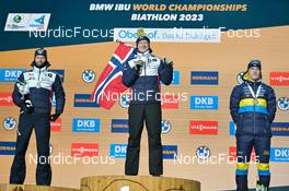 15.02.2023, Oberhof, Germany (GER): Sturla Holm Laegreid (NOR), Johannes Thingnes Boe (NOR), Sebastian Samuelsson (SWE), (l-r) - IBU World Championships Biathlon, medals, Oberhof (GER). www.nordicfocus.com. © Reichert/NordicFocus. Every downloaded picture is fee-liable.