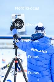 26.11.2023, Oestersund, Sweden, (SWE): Event Feature: Coach team Finland holding the target board - IBU World Cup Biathlon, individual men, Oestersund (SWE). www.nordicfocus.com. © Manzoni/NordicFocus. Every downloaded picture is fee-liable.