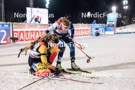 25.11.2023, Oestersund, Sweden, (SWE): Maya Cloetens (BEL), Noora Kaisa Keranen (FIN), (l-r) - IBU World Cup Biathlon, mixed relay, Oestersund (SWE). www.nordicfocus.com. © Manzoni/NordicFocus. Every downloaded picture is fee-liable.