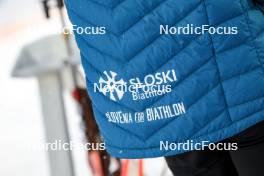 02.12.2023, Oestersund, Sweden, (SWE): Event Feature: Sloski Biathlon logo on jacket - IBU World Cup Biathlon, sprint men, Oestersund (SWE). www.nordicfocus.com. © Manzoni/NordicFocus. Every downloaded picture is fee-liable.