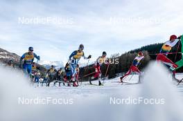 01.01.2023, Val Mustair, Switzerland (SUI): Vitaliy Pukhkalo (KAZ), Lauri Lepisto (FIN), Philipp Leodolter (AUT), Cla-Ursin Nufer (SUI), (l-r)  - FIS world cup cross-country, tour de ski, pursuit, Val Mustair (SUI). www.nordicfocus.com. © Modica/NordicFocus. Every downloaded picture is fee-liable.