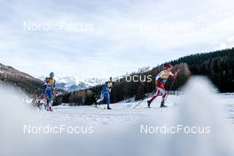 01.01.2023, Val Mustair, Switzerland (SUI): Miha Simenc (SLO), Roman Schaad (SUI), (l-r)  - FIS world cup cross-country, tour de ski, pursuit, Val Mustair (SUI). www.nordicfocus.com. © Modica/NordicFocus. Every downloaded picture is fee-liable.