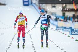 06.01.2023, Val di Fiemme, Italy (ITA): Johannes Hoesflot Klaebo (NOR), Simone Mocellini (ITA), (l-r)  - FIS world cup cross-country, tour de ski, individual sprint, Val di Fiemme (ITA). www.nordicfocus.com. © Modica/NordicFocus. Every downloaded picture is fee-liable.