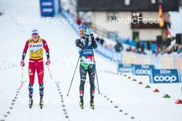 06.01.2023, Val di Fiemme, Italy (ITA): Johannes Hoesflot Klaebo (NOR), Simone Mocellini (ITA), (l-r)  - FIS world cup cross-country, tour de ski, individual sprint, Val di Fiemme (ITA). www.nordicfocus.com. © Modica/NordicFocus. Every downloaded picture is fee-liable.