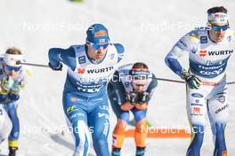 06.01.2023, Val di Fiemme, Italy (ITA): Perttu Hyvarinen (FIN), Johan Haeggstroem (SWE), (l-r)  - FIS world cup cross-country, tour de ski, individual sprint, Val di Fiemme (ITA). www.nordicfocus.com. © Modica/NordicFocus. Every downloaded picture is fee-liable.