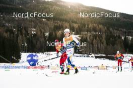 07.01.2023, Val di Fiemme, Italy (ITA): Simen Hegstad Krueger (NOR), William Poromaa (SWE), (l-r)  - FIS world cup cross-country, tour de ski, mass, Val di Fiemme (ITA). www.nordicfocus.com. © Modica/NordicFocus. Every downloaded picture is fee-liable.