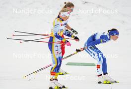 07.01.2023, Val di Fiemme, Italy (ITA): Frida Karlsson (SWE), Kerttu Niskanen (FIN) - FIS world cup cross-country, tour de ski, mass, Val di Fiemme (ITA). www.nordicfocus.com. © Barbieri/NordicFocus. Every downloaded picture is fee-liable.