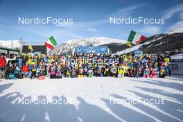 22.01.2023, Livigno, Italy (ITA): Federico Pellegrino (ITA) and Francesco De Fabiani (ITA) with the Italian Team Staff and their fans (Chicco Pellegrino Official Fan Club) (l-r)  - FIS world cup cross-country, team sprint, Livigno (ITA). www.nordicfocus.com. © Modica/NordicFocus. Every downloaded picture is fee-liable.