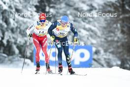 27.01.2023, Les Rousses, France (FRA): Jonas Baumann (SUI), Lucas Boegl (GER), (l-r)  - FIS world cup cross-country, 10km, Les Rousses (FRA). www.nordicfocus.com. © Authamayou/NordicFocus. Every downloaded picture is fee-liable.