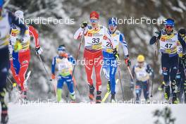 29.01.2023, Les Rousses, France (FRA): Candide Pralong (SUI), Arsi Ruuskanen (FIN), (l-r)  - FIS world cup cross-country, mass, Les Rousses (FRA). www.nordicfocus.com. © Thibaut/NordicFocus. Every downloaded picture is fee-liable.