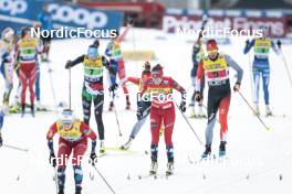 19.03.2023, Falun, Sweden (SWE): Heidi Weng (NOR), Antoine Cyr (CAN), (l-r)  - FIS world cup cross-country, mixed relay, Falun (SWE). www.nordicfocus.com. © Modica/NordicFocus. Every downloaded picture is fee-liable.