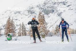 03.11.2023, Bessans, France (FRA): Simon Fourcade (FRA), Coach Team France, Quentin Fillon-Maillet (FRA),, (l-r) -. www.nordicfocus.com. © Authamayou/NordicFocus. Every downloaded picture is fee-liable.