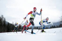 03.03.2023, Planica, Slovenia (SLO): Antoine Cyr (CAN), Jens Burman (SWE), (l-r)  - FIS nordic world ski championships cross-country, relay men, Planica (SLO). www.nordicfocus.com. © Modica/NordicFocus. Every downloaded picture is fee-liable.