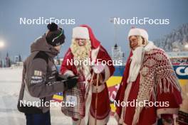 26.11.2023, Ruka, Finland (FIN): Federico Pellegrino (ITA) with Santa Claus - FIS world cup cross-country, mass, Ruka (FIN). www.nordicfocus.com. © Modica/NordicFocus. Every downloaded picture is fee-liable.