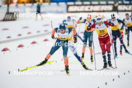 16.12.2023, Trondheim, Norway (NOR): Qiang Wang (CHN), Edvard Sandvik (NOR), (l-r)  - FIS world cup cross-country, skiathlon, Trondheim (NOR). www.nordicfocus.com. © Modica/NordicFocus. Every downloaded picture is fee-liable.