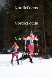 31.12.2023, Toblach, Italy (ITA): Haavard Solaas Taugboel (NOR), Michael Foettinger (AUT), (l-r) - FIS world cup cross-country, tour de ski, 10km, Toblach (ITA). www.nordicfocus.com. © Modica/NordicFocus. Every downloaded picture is fee-liable.