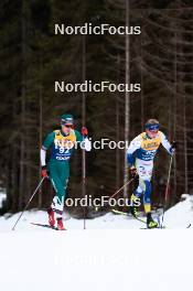 31.12.2023, Toblach, Italy (ITA): Adam Konya (HUN), Truls Gisselman (SWE), (l-r) - FIS world cup cross-country, tour de ski, 10km, Toblach (ITA). www.nordicfocus.com. © Modica/NordicFocus. Every downloaded picture is fee-liable.
