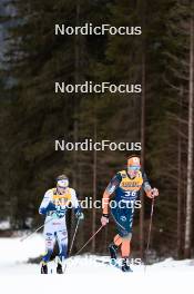 31.12.2023, Toblach, Italy (ITA): Edvin Anger (SWE), Andrew Musgrave (GBR), (l-r) - FIS world cup cross-country, tour de ski, 10km, Toblach (ITA). www.nordicfocus.com. © Modica/NordicFocus. Every downloaded picture is fee-liable.