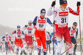 21.01.2023, Klingenthal, Germany (GER): Tomas Portyk (CZE), Akito Watabe (JPN), Ondrej Pazout (CZE), David Mach (GER), (l-r)  - FIS world cup nordic combined men, individual gundersen HS140/10km, Klingenthal (GER). www.nordicfocus.com. © Volk/NordicFocus. Every downloaded picture is fee-liable.