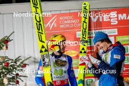 15.12.2023, Ramsau, Austria (AUT): Ilkka Herola (FIN), Thomas Rettenegger (AUT), (l-r)  - FIS world cup nordic combined men, mass HS98/10km, Ramsau (AUT). www.nordicfocus.com. © Volk/NordicFocus. Every downloaded picture is fee-liable.