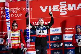 15.01.2023, Zakopane, Poland (POL): Halvor Egner Granerud (NOR), Stefan Kraft (AUT), Dawid Kubacki (POL), (l-r)  - FIS world cup ski jumping men, individual HS140, Zakopane (POL). www.nordicfocus.com. © Thibaut/NordicFocus. Every downloaded picture is fee-liable.