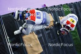 14.01.2023, Zakopane, Poland (POL): Daniel Andrei Cacina (ROU), Pawel Wasek (POL),  Feature - FIS world cup ski jumping men, team HS140, Zakopane (POL). www.nordicfocus.com. © Thibaut/NordicFocus. Every downloaded picture is fee-liable.