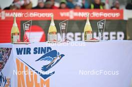 29.01.2023, Kulm, Austria (AUT): feature Ceremony bottles and trophies - FIS world cup ski jumping men, individual HS134, Kulm (AUT). www.nordicfocus.com. © Reichert/NordicFocus. Every downloaded picture is fee-liable.