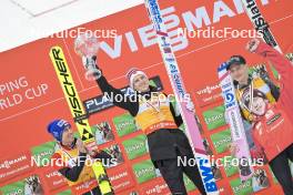 31.03.2023, Planica, Slovenia (SLO): Stefan Kraft (AUT), Halvor Egner Granerud (NOR), Anze Lanisek (SLO), Podium Overall Worldcup (l-r) - FIS world cup ski flying men, cups, Planica (SLO). www.nordicfocus.com. © Reichert/NordicFocus. Every downloaded picture is fee-liable.